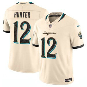 Jacksonville Jaguars 12 Travis Hunter Cream 2026 Rivalries F.U.S.E. Vapor Limited Men Jersey